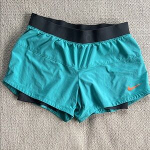 Nike Women's Athletic Shorts in Teal and Black